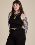 Racerback Tank in Black angled front view on Sydney