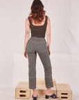 Back view of Railroad Carpenter Jeans in Vintage Tan and espresso brown Square Neck Tank on Alex