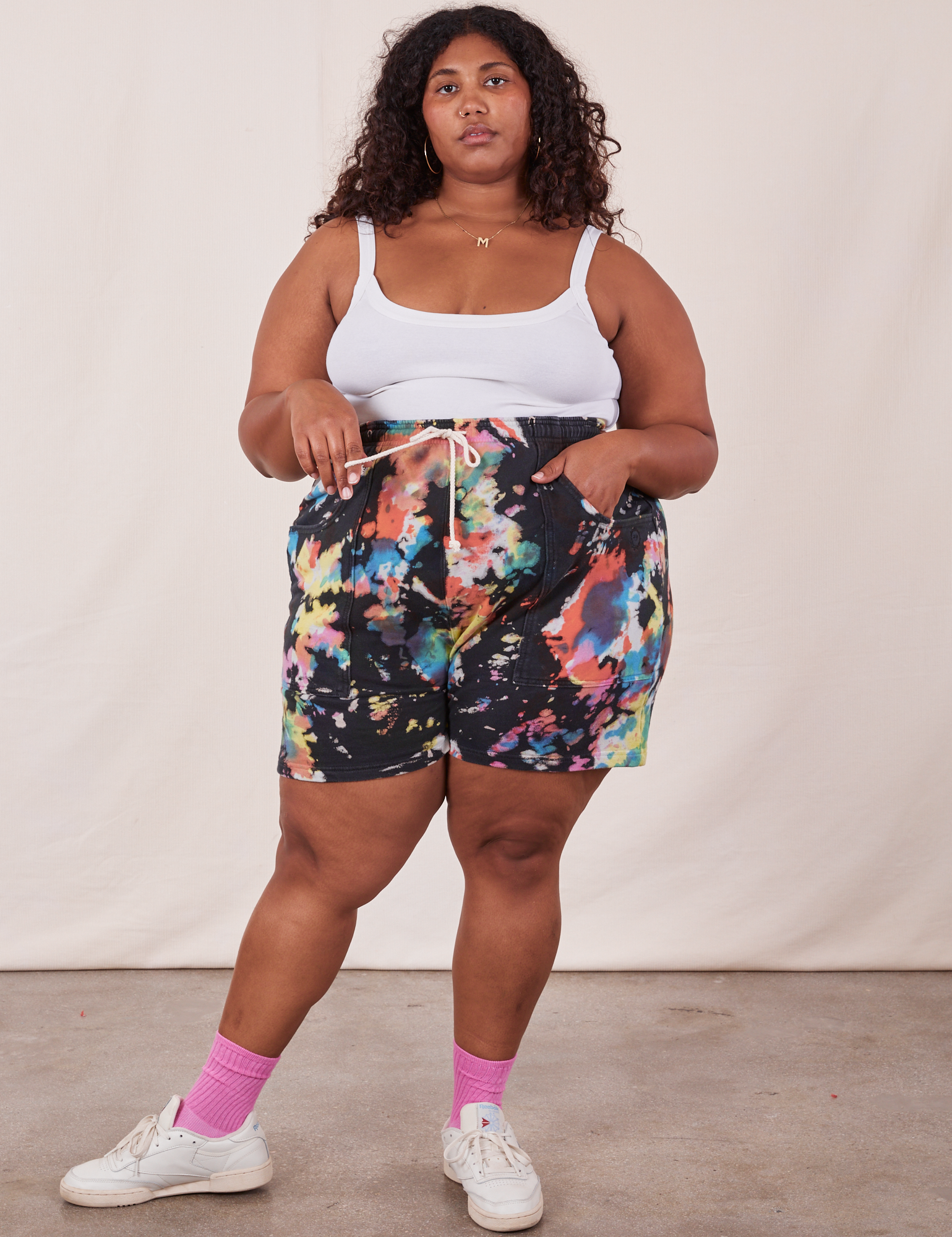 Morgan is 5&#39;5&quot; and wearing 1XL Sweat Shorts in Rainbow Magic Waters paired with vintage off-white Cami