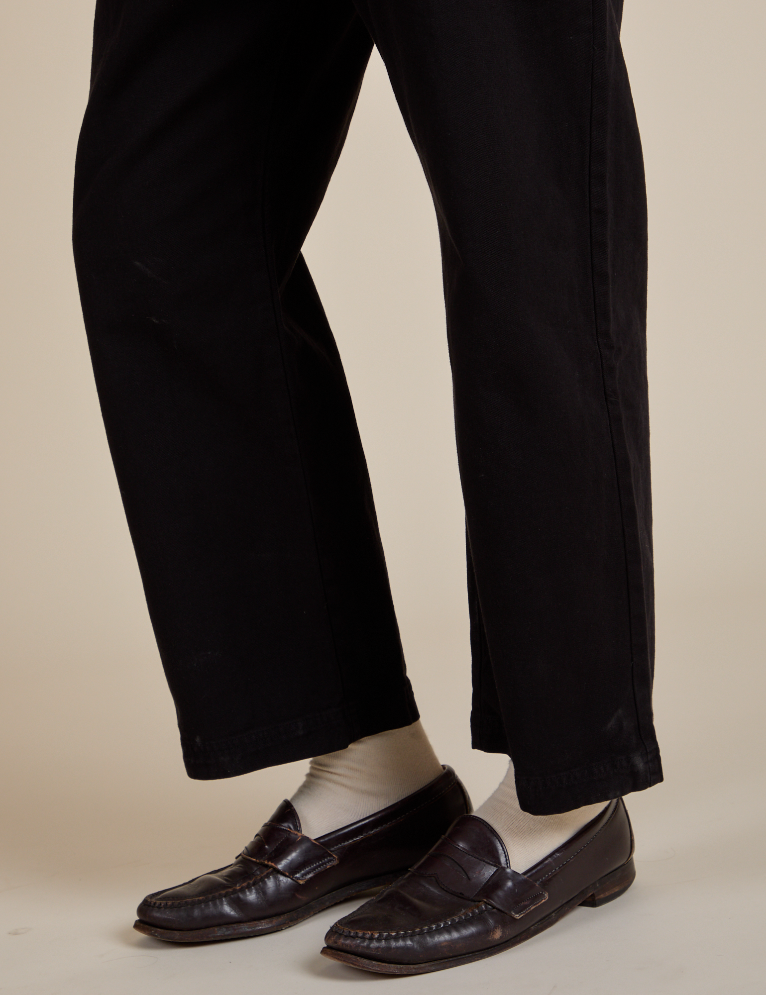 Short Sleeve Jumpsuit in Basic Black pant leg close up on Quinn