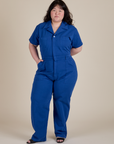 Ashley is 5'7" and wearing 1XL  Sleeve Jumpsuit in Royal Blue