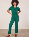 Gabi is 5'7" and wearing XS Short Sleeve Jumpsuit in Hunter Green