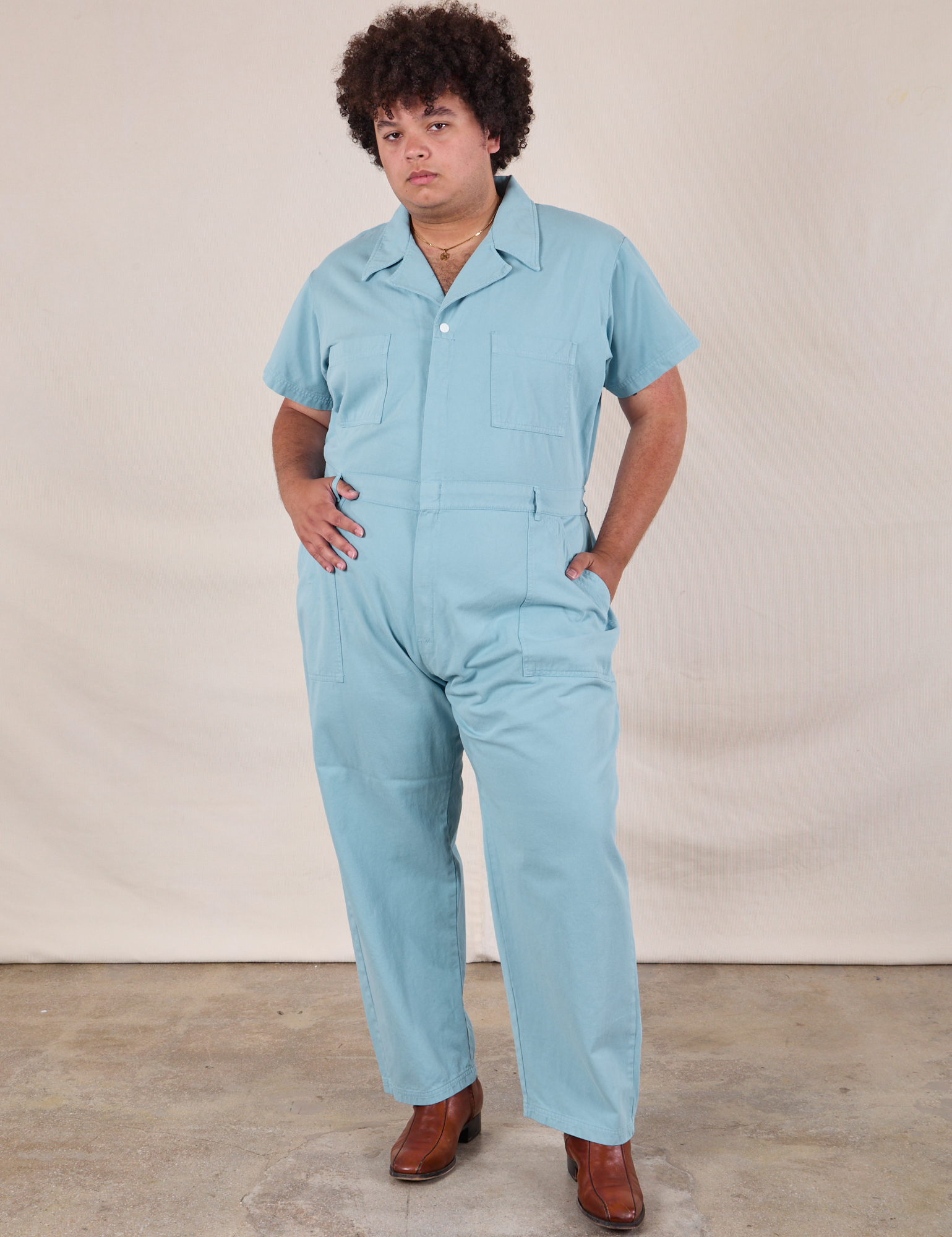 Miguel is 6&#39;0&quot; and wearing 2XL Short Sleeve Jumpsuit in Baby Blue
