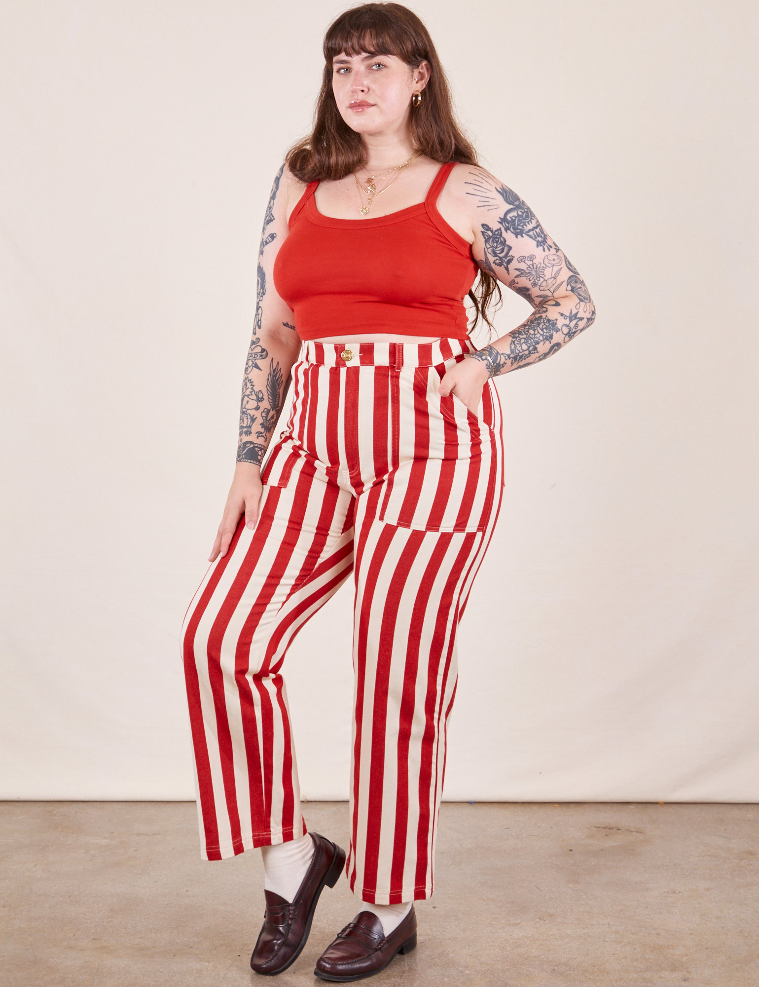 Angled view of Work Pants in Cherry Stripe and mustang red Cropped Cami
