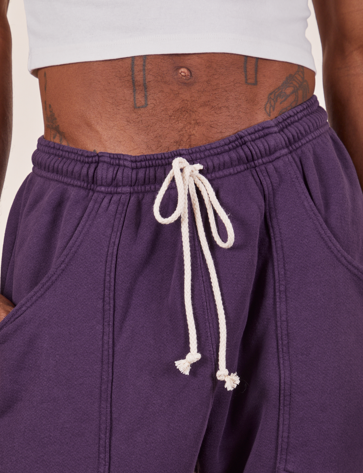 Cropped Rolled Cuff Sweatpants in Nebula Purple front close up on Jerrod