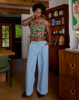 Cropped Tank Top in Kitchen Collection and light wash Indigo Wide Leg Trousers on Jerrod