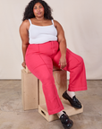 Morgan is wearing Western Pants in Hot Pink and Cropped Cami in vintage tee off-white