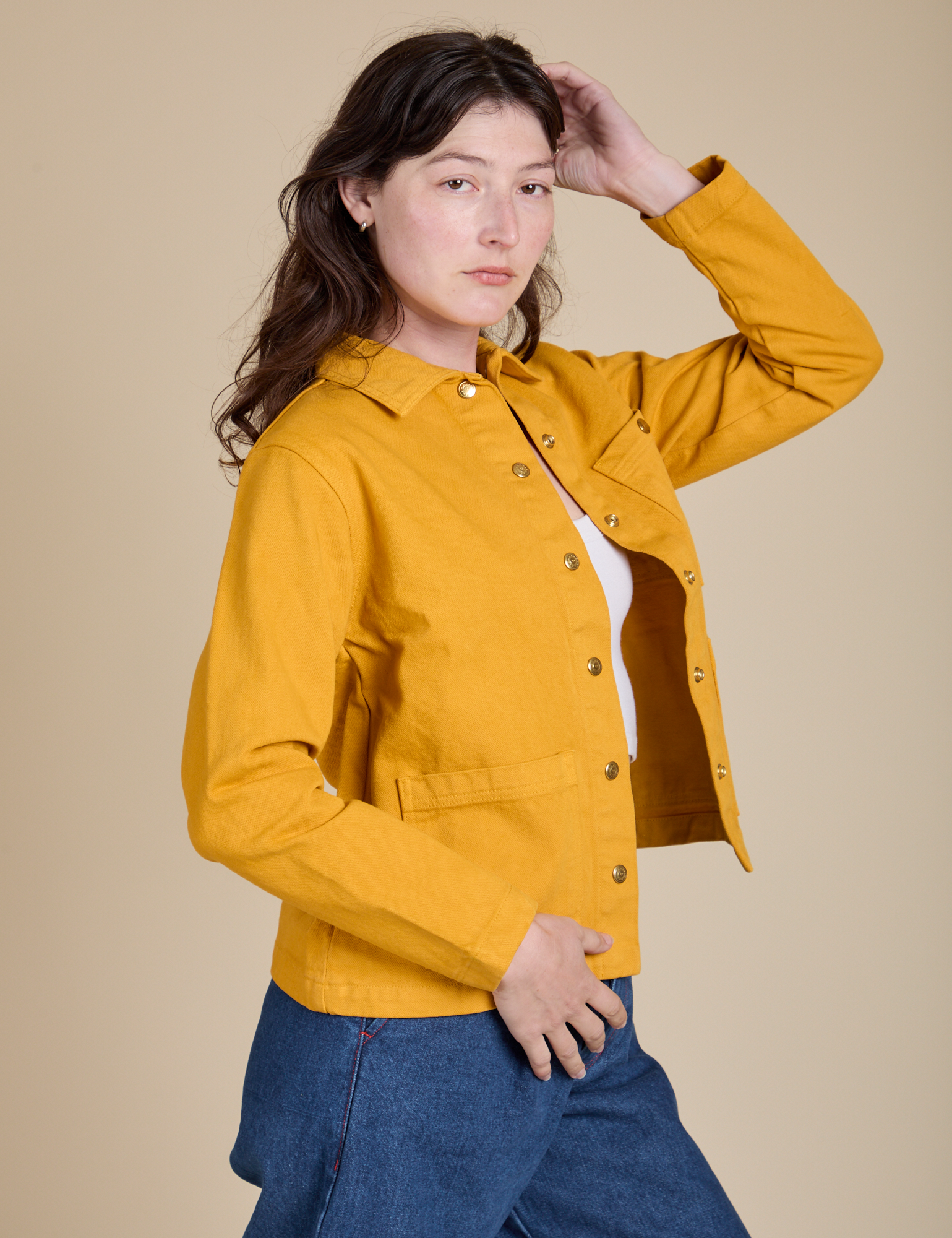 Side view of Denim Work Jacket in Mustard Yellow on Alex