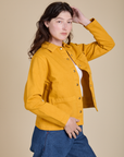 Side view of Denim Work Jacket in Mustard Yellow on Alex