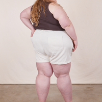 Back view of Classic Work Shorts in Vintage Off-White and espresso brown Tank Top worn by Catie