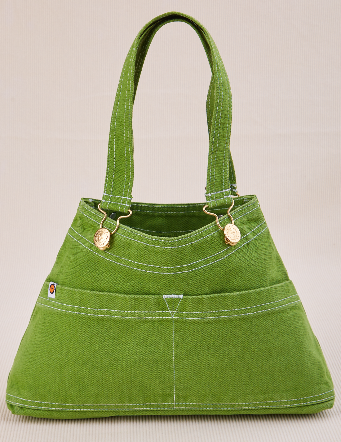 Overall Handbag in Bright Olive with handle straps standing up