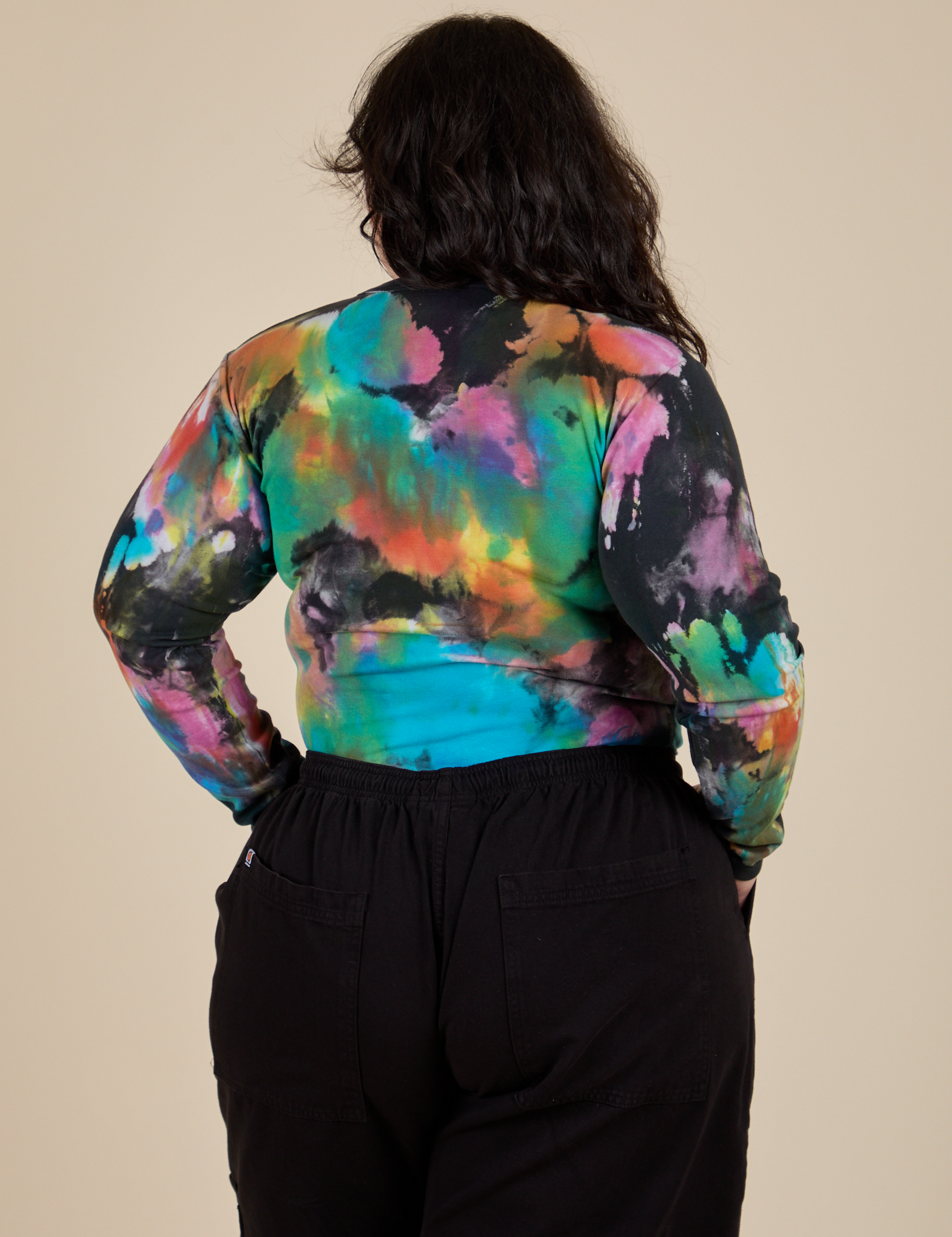 Long Sleeve Baby Tee in Rainbow Magic Waters back view on Ashley