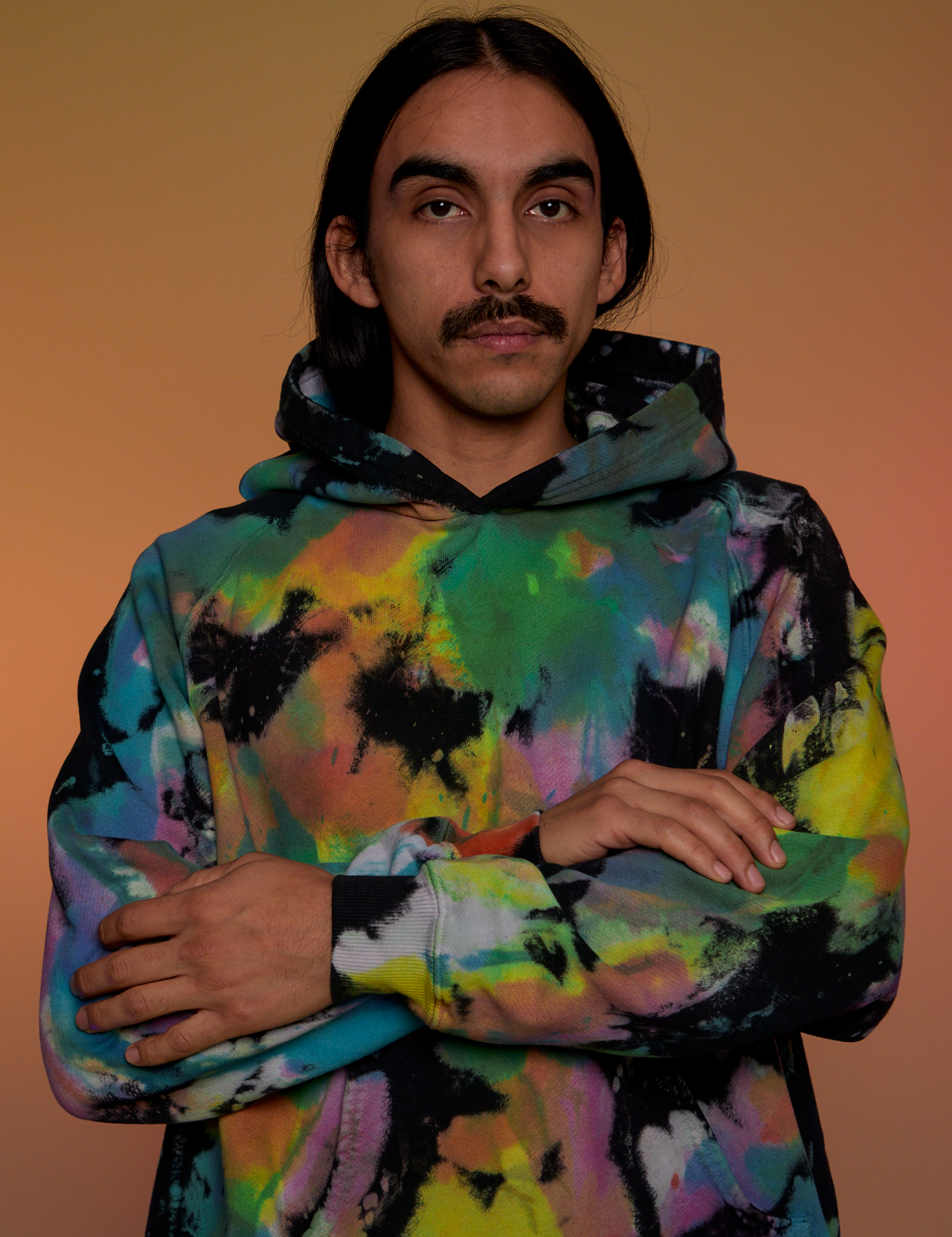 Oversized Hoodie in Rainbow Magic Waters front close up on Anthony