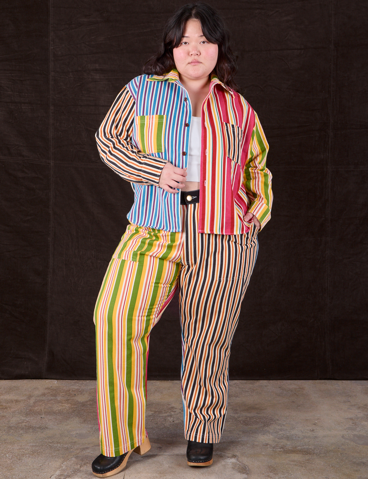 Ashley is 5’7” and wearing 1XL Mixed Stripe Work Pants paired with a matching Cropped Overshirt