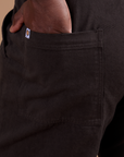 Close up of Demi's hand in the back pocket of Work Pants in Espresso Brown