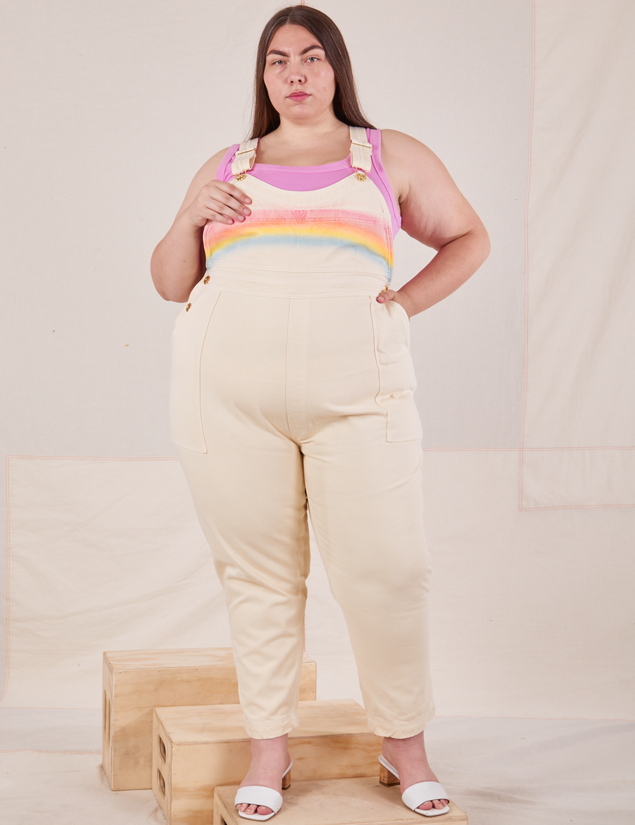 Marielena is 5'8" and wearing 1XL Rainbow Overalls