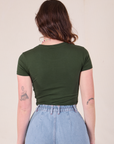 Baby Tee in Swamp Green back view on Alex