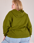 Collegiate Hoodie in Summer Olive back view on Juliet