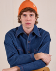 Quinn is wearing Ribbed Beanie in Construction Orange