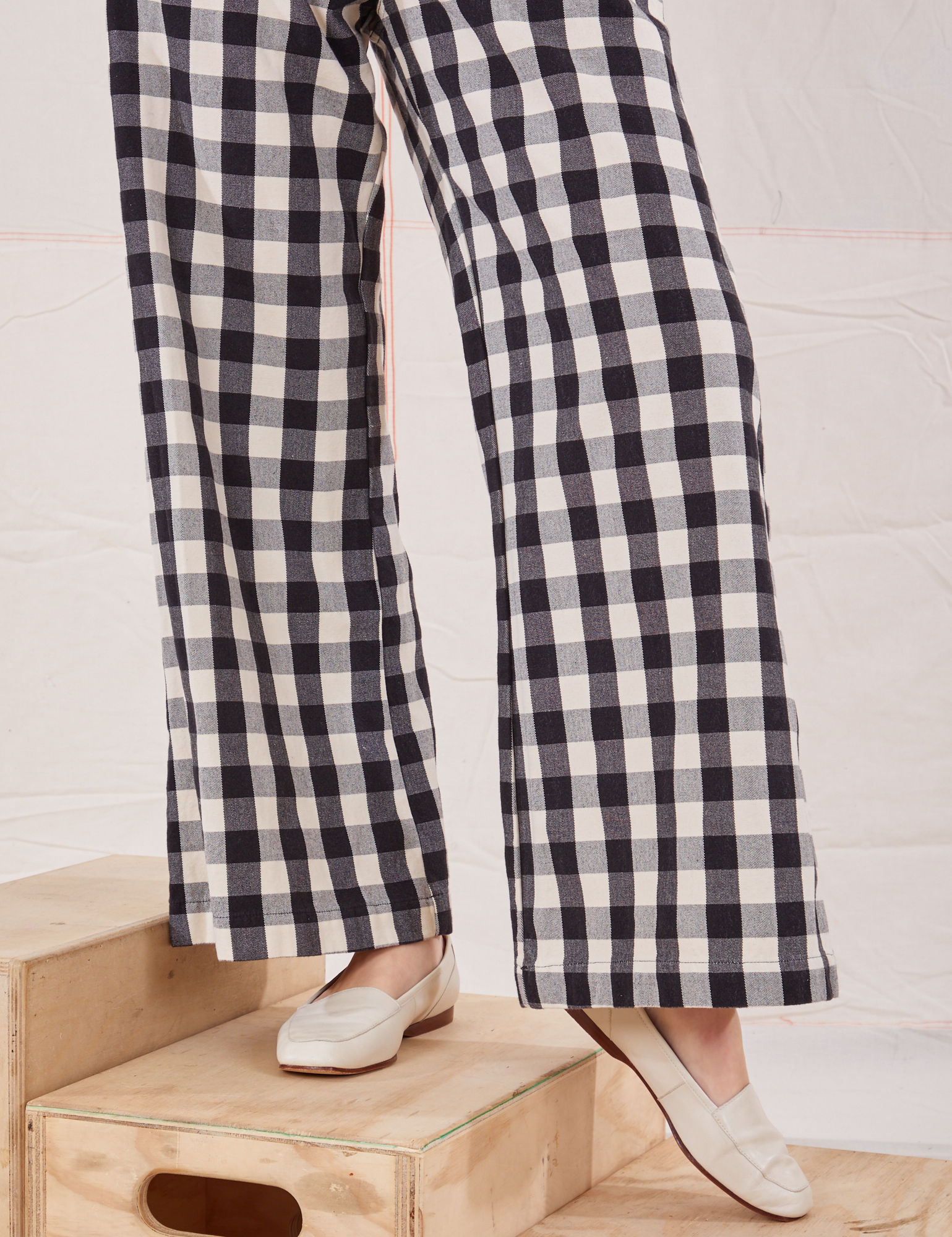 Wide Leg Trousers in Big Gingham pant leg close up on Alex