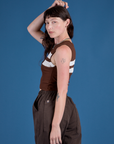 Side view of Painted Muscle Tee in Fudgesicle Brown on Alex