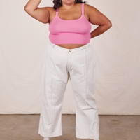 Alicia is wearing Cropped Cami in Bubblegum Pink and vintage off-white Western Pants