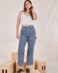 Allison is wearing Carpenter Jeans in Railroad Stripes and vintage off-white Cami