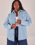 Meghna is 5'7" and wearing XS Denim Overshirt in Light Wash