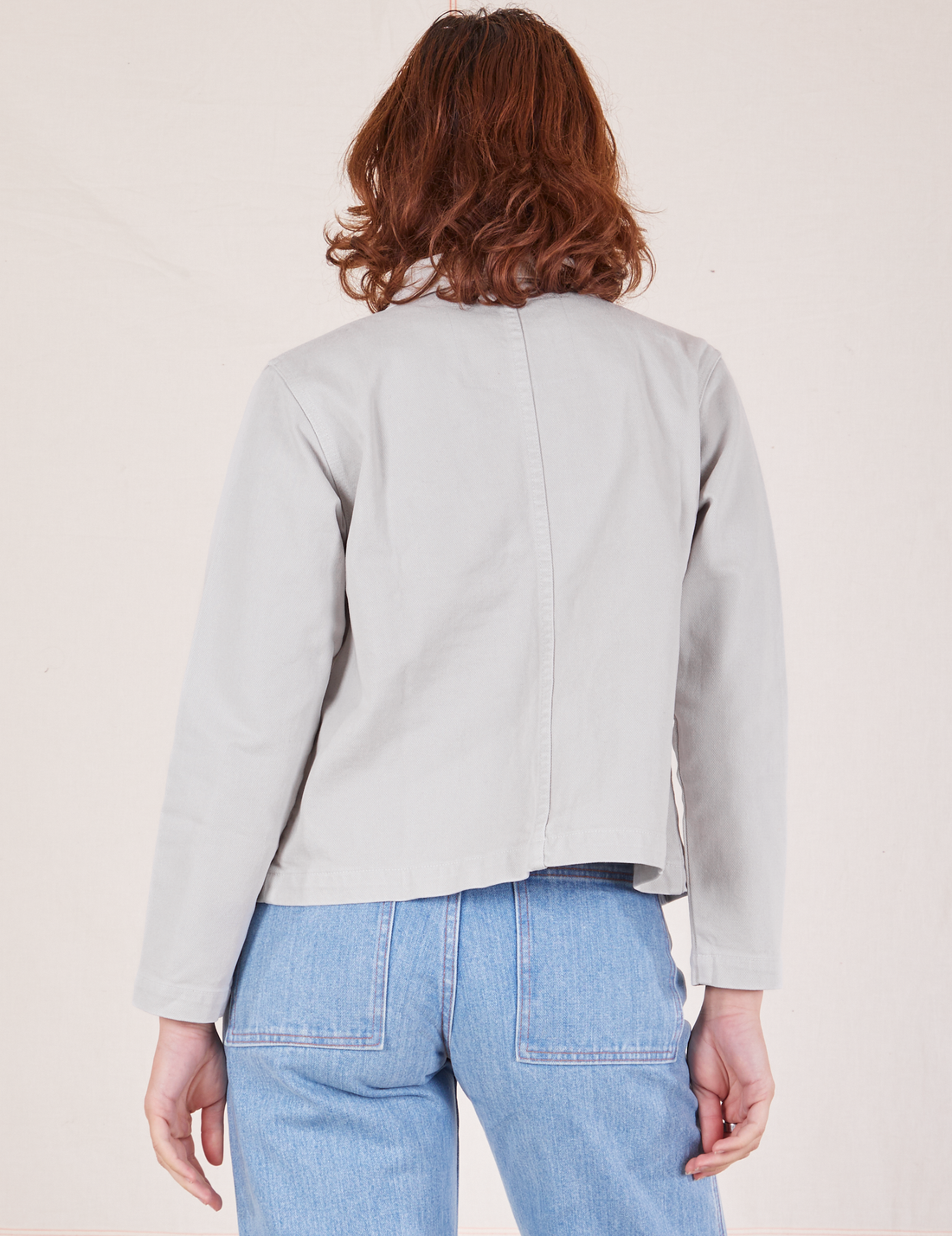 Back view of Denim Work Jacket in Dishwater White worn by Alex