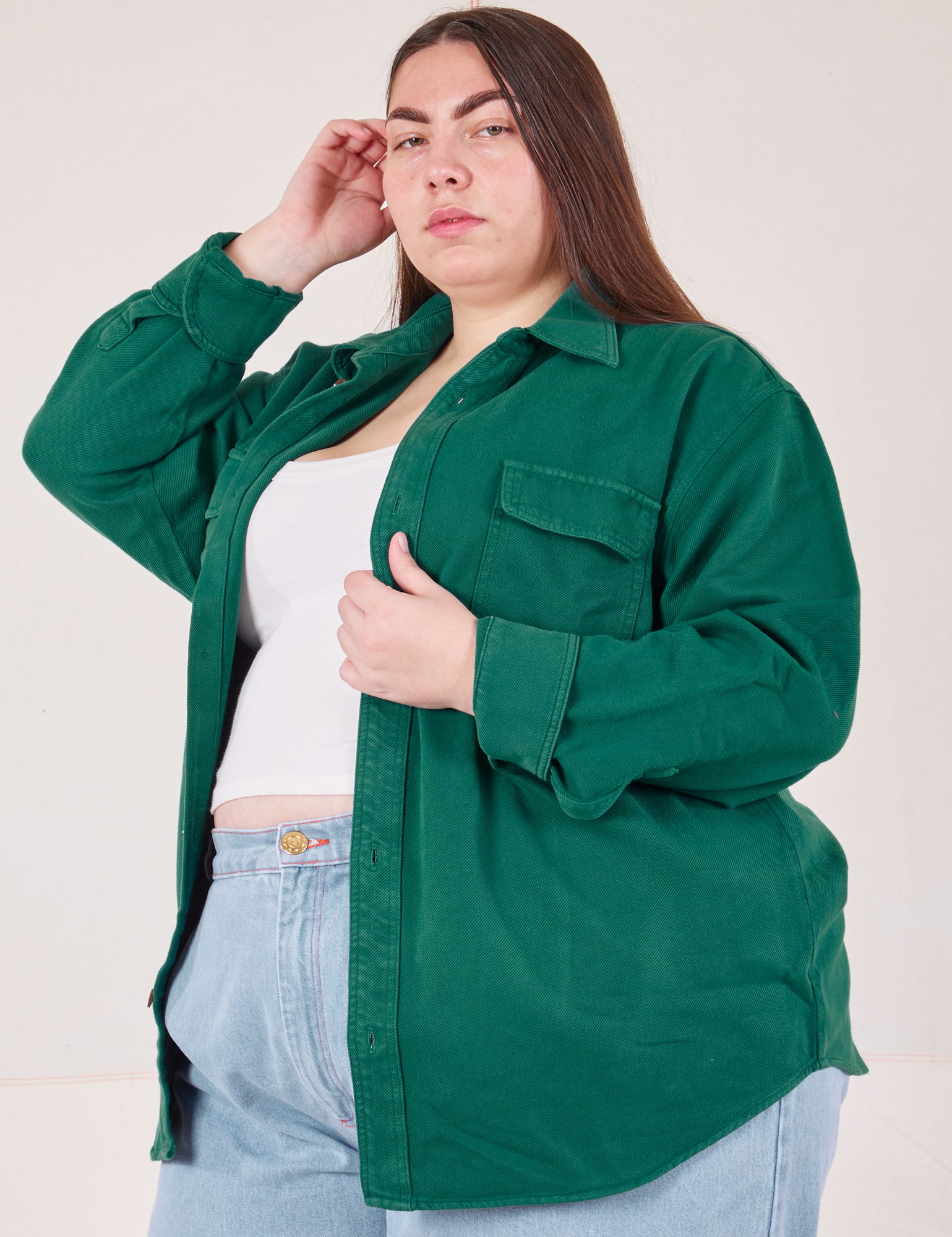 Angled front view of Flannel Overshirt in Hunter Green on Marielena