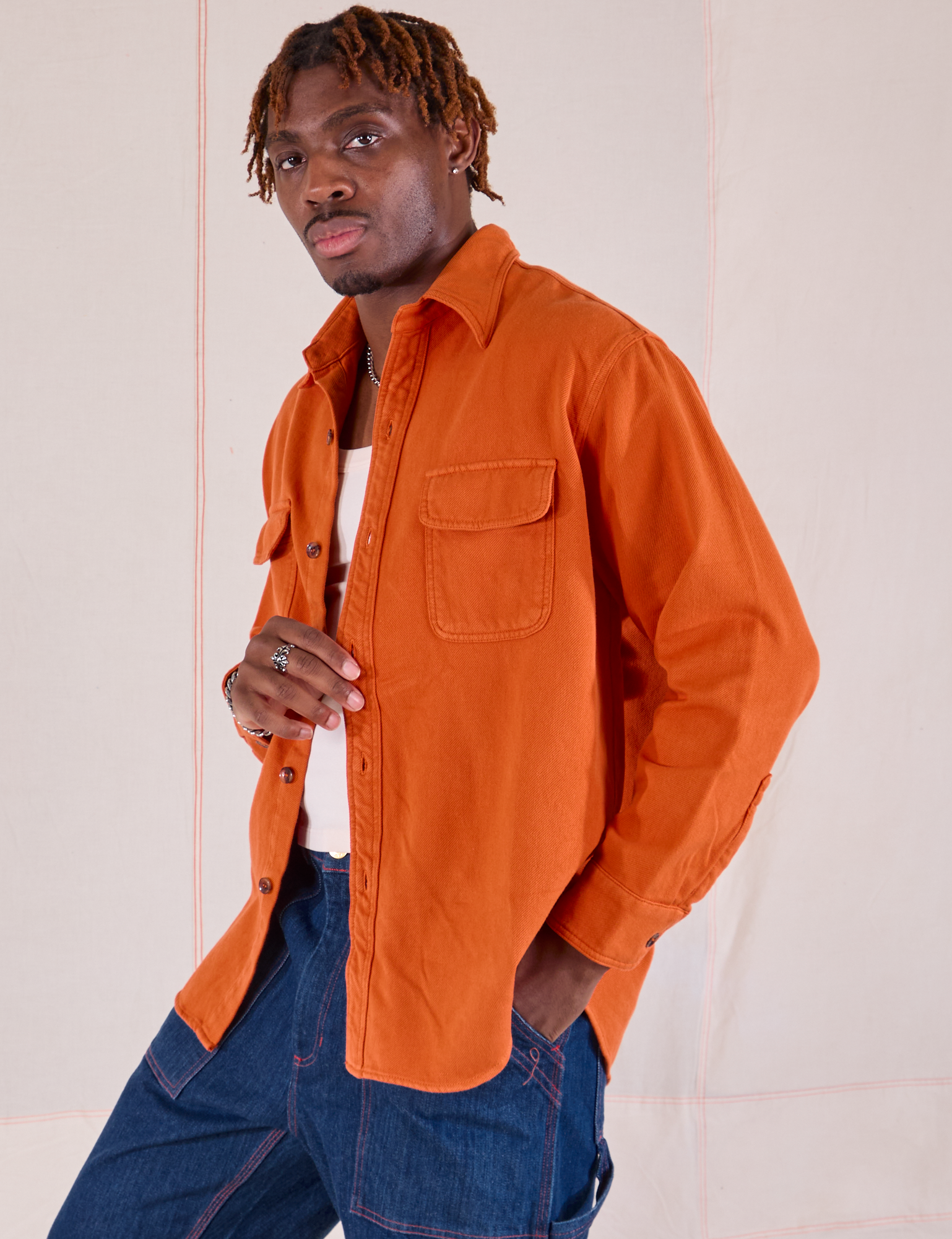 Flannel Overshirt in Burnt Orange angled front view on Isaac