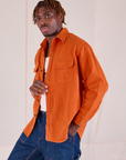 Flannel Overshirt in Burnt Orange angled front view on Isaac