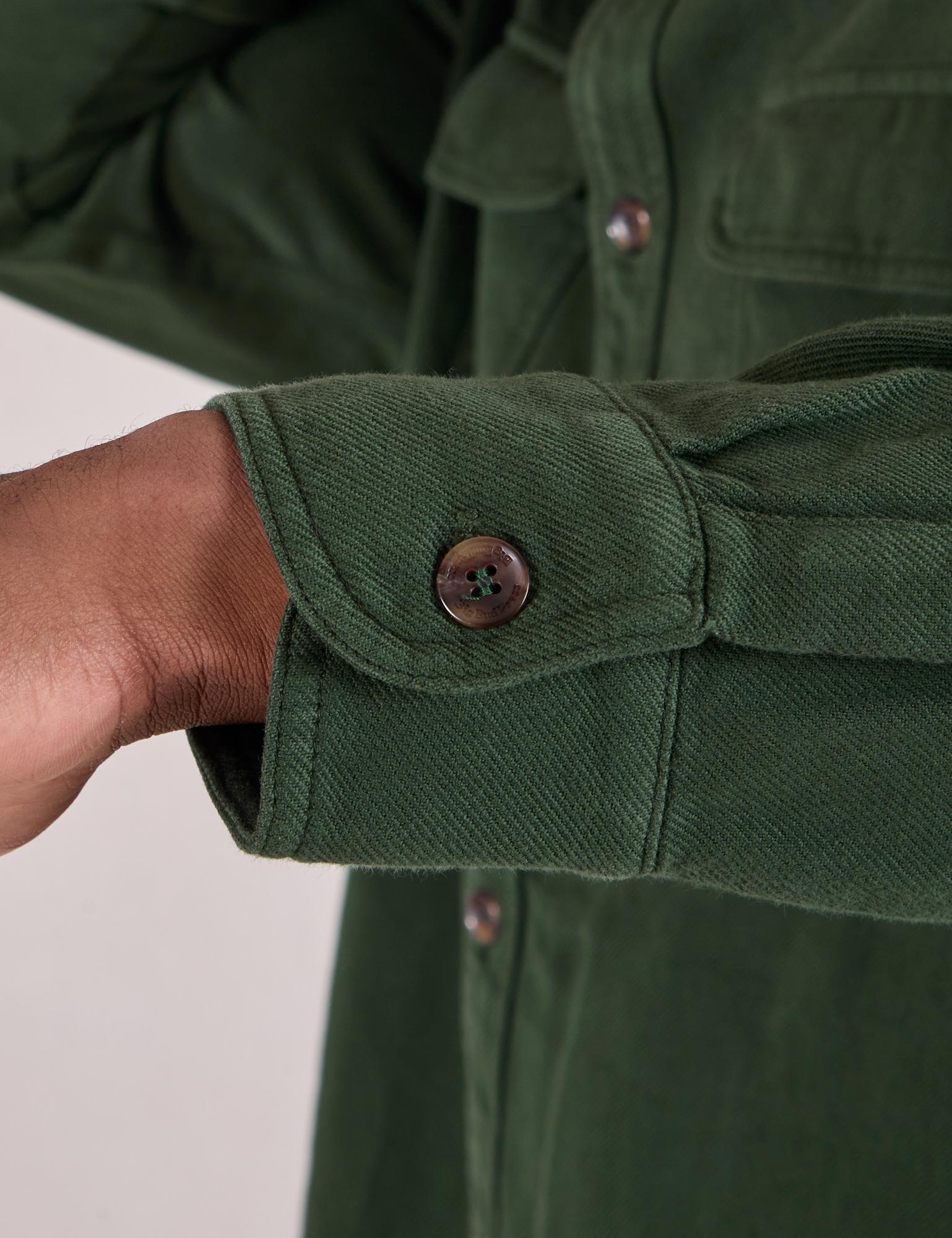 Flannel Overshirt in Swamp Green sleeve cuff close up