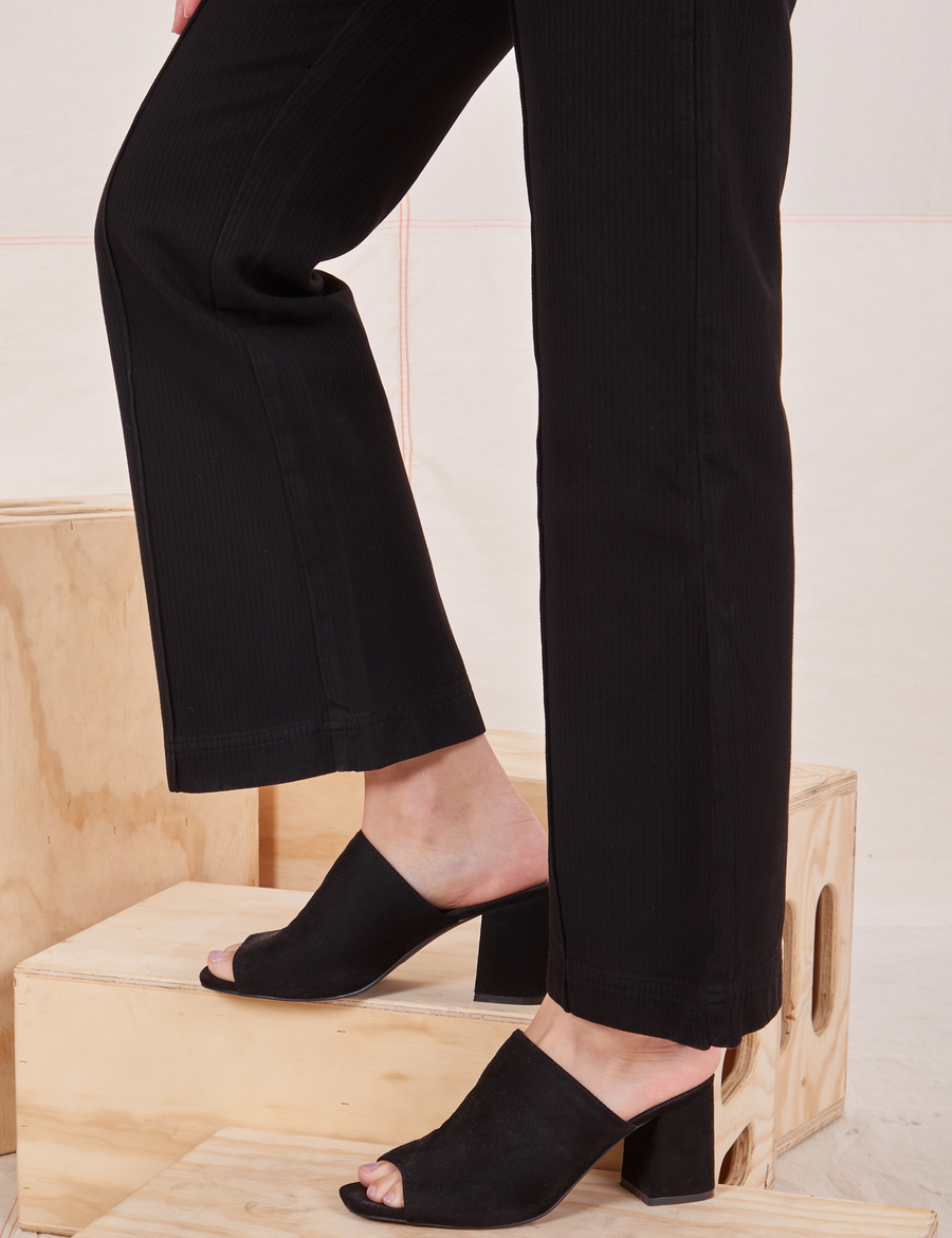Heritage Westerns in Basic Black pant leg side view close up on Alex