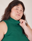 Close up of Sleeveless Essential Turtleneck in Hunter Green on Ashley