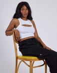 Kandia wearing the Vintage Tee White Porthole Tank and Black Drop Pocket Cargo Pants