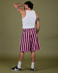 Back view of  Longline Work Shorts in Bubblegum Pink and vintage tee white Cropped Tank on Jesse