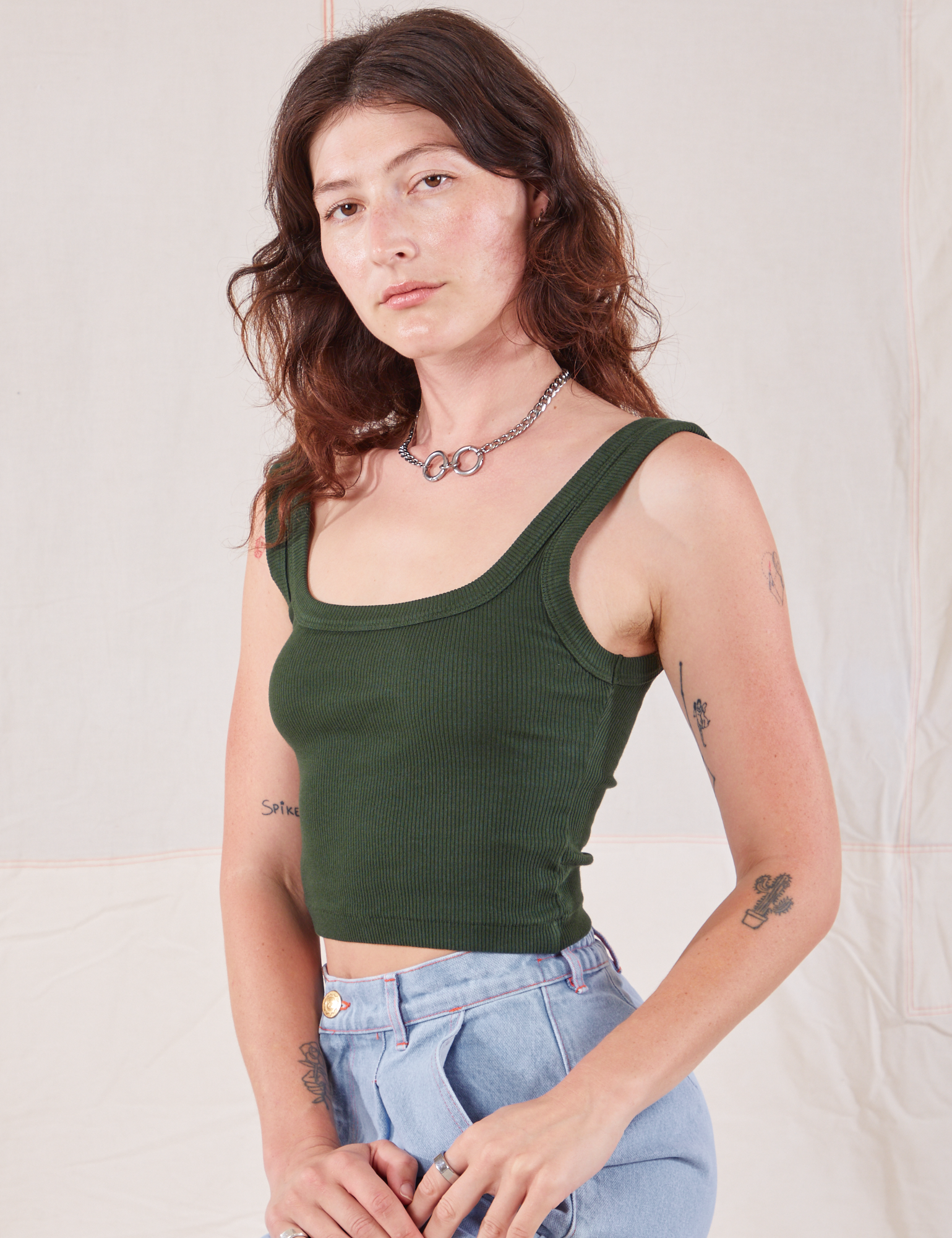 Square Neck Tank in Swamp Green angled front view on Alex