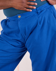 Mid-Rise Pleated Trousers in Royal Blue front close up on Elijah