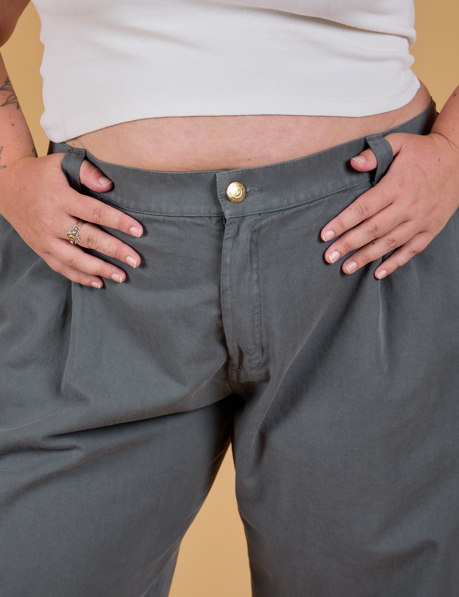 Baggy Mid-Rise Trousers in Slate Grey front close up on Juliet