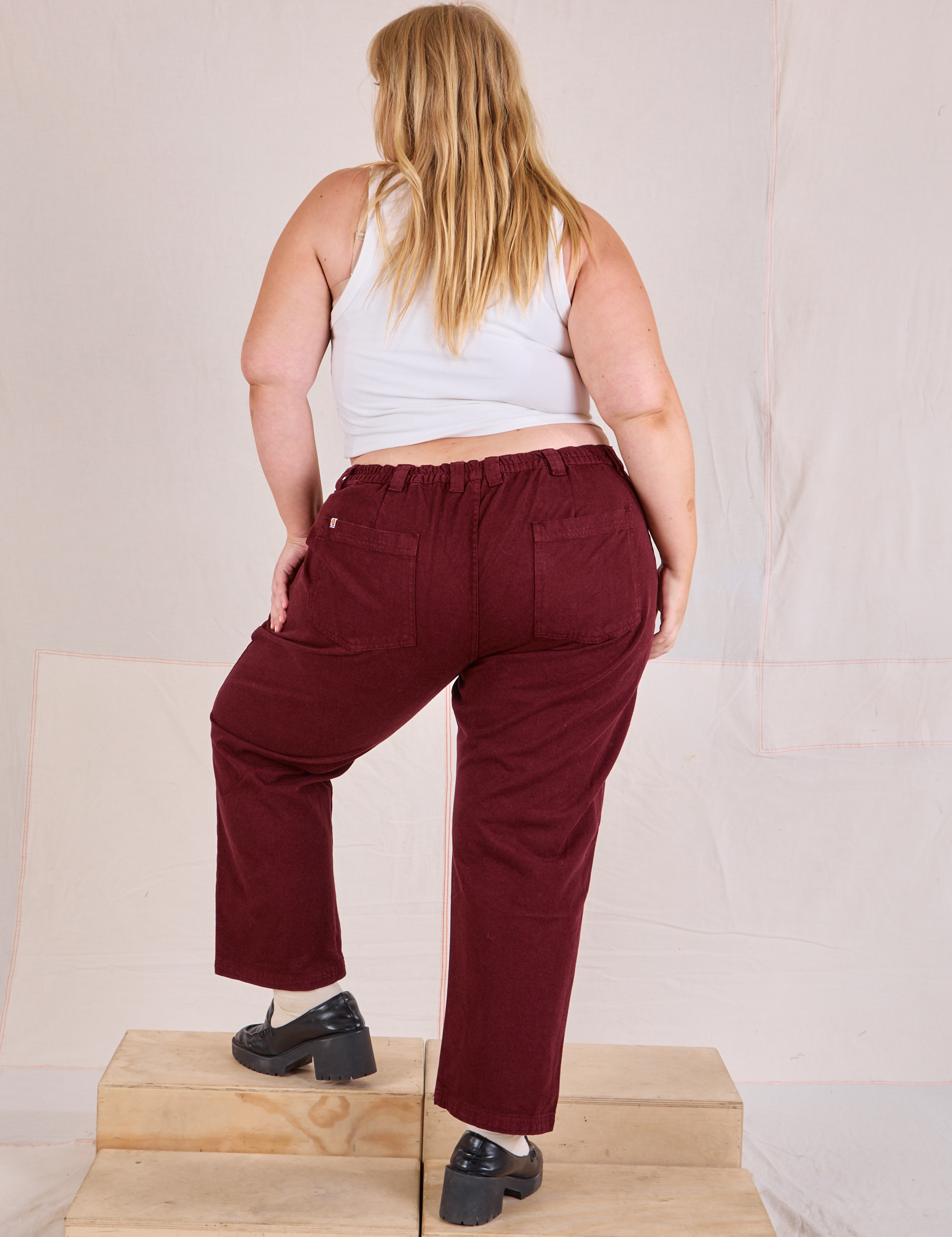 Mid-Rise Work Pants in Red Wine back view on Juliet