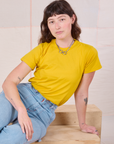 Alex is wearing Organic Vintage Tee in Golden Yellow