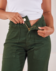 Organic Work Pants in Swamp Green front close up on Mika