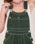 Original Overalls in Swamp Green front close up on Alex