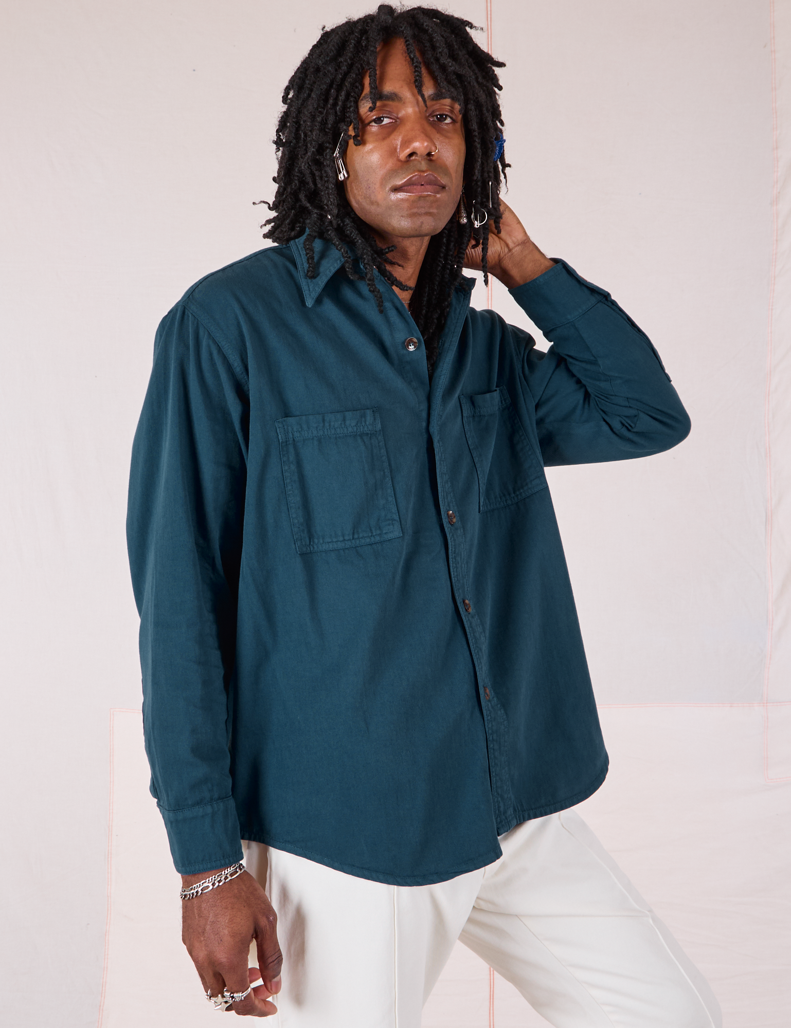 Angled front view of Twill Overshirt in Lagoon on Jerrod