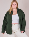 Juliet is wearing Twill Overshirt in Swamp Green and Cropped Cami in vintage tee off-white