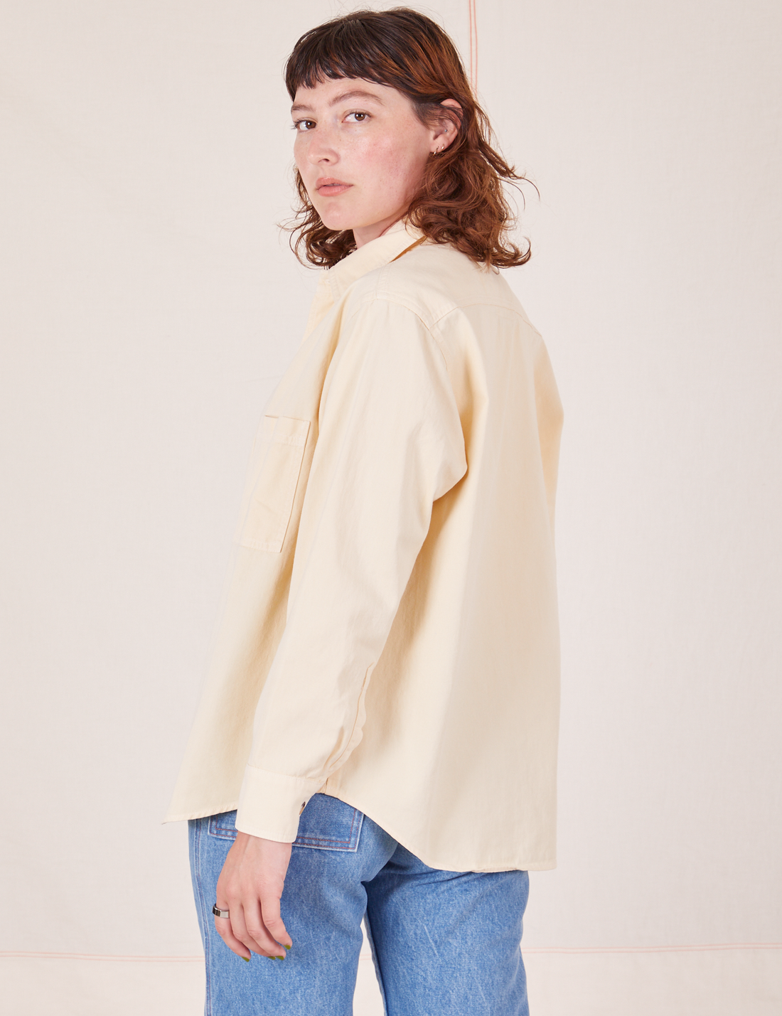 Side view of Oversize Overshirt in Vintage Off-White worn by Alex