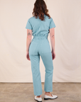 Short Sleeve Jumpsuit in Baby Blue back view on Alex