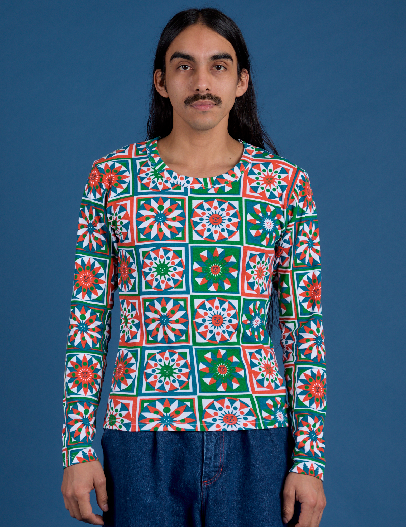 Anthony is 5’6” and wearing S Long Sleeve Baby Tee in Quilt Print