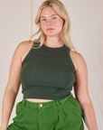 Lish is 5’8” and wearing L Racerback Tank in Swamp Green